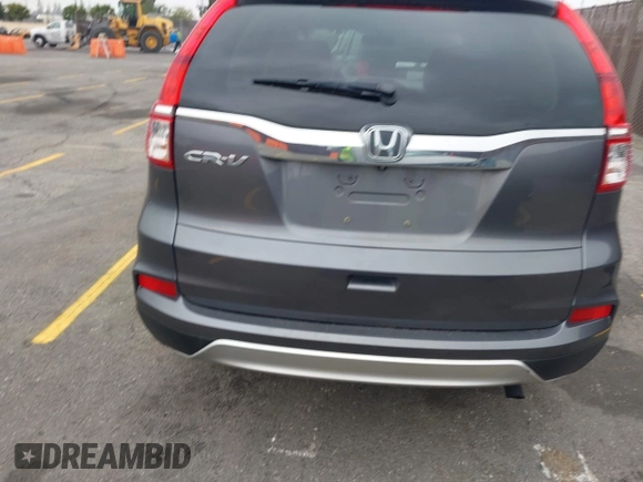 2015 Honda CR-V EX with VIN 3CZRM3H51FG704087, listed as a IAAI auction lot 42074521 with 74,610 mi miles and . Bid and sale history available at carsss.com. Image 16.
