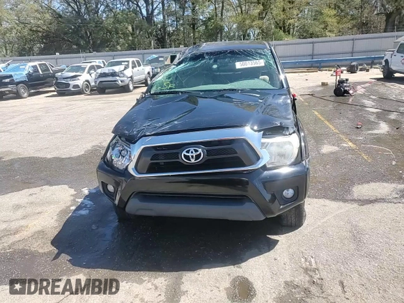 2015 Toyota Tacoma with VIN 5TFUU4ENXFX122446, listed as a Copart auction lot 50013565 with 72,204 mi miles and Salvage title. Bid and sale history available at DreamBid. Image 14.