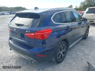 2018 BMW X1 sDrive28i with VIN WBXHU7C34J5H44572, listed as a IAAI auction lot 41607151 with 43,056 mi miles. Bid and sale history available at carsss.com. Image 4.