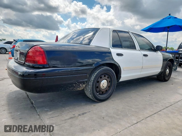 2010 Ford Police Interceptor with VIN 2FABP7BV0AX146445, listed as a Copart auction lot 62375055 with Not provided miles and Salvage title. Bid and sale history available at DreamBid. Image 3.