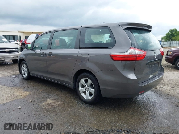 2015 Toyota Sienna L with VIN 5TDZK3DC8FS678539, listed as a IAAI auction lot 42115498 with 111,417 mi miles and . Bid and sale history available at DreamBid. Image 3.