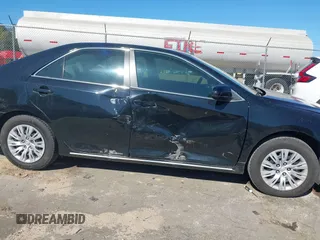 2014 Toyota Camry L with VIN 4T4BF1FK0ER415343, listed as a IAAI auction lot 41845661 with 25,247 mi miles and . Bid and sale history available at DreamBid. Image 14.