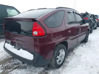 2002 Pontiac Aztek z VIN 3G7DA03E72S599401, wystawiony jako IAAI lot #41248586 z przebiegiem 135 971 mil mil oraz . Historia ofert i sprzedaży dostępna na DreamBid. Obrazek 4.