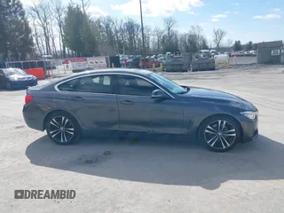 2016 BMW 4 Series 428i xDrive with VIN WBA4C9C56GG140427, listed as a IAAI auction lot 41886670 with 94,426 mi miles and . Bid and sale history available at carsss.com. Image 13.