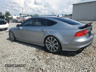 2013 Audi A7 Prestige with VIN WAU2GAFC1DN074660, listed as a Copart auction lot 62410655 with 164,801 mi miles and Salvage title. Bid and sale history available at DreamBid. Image 2.