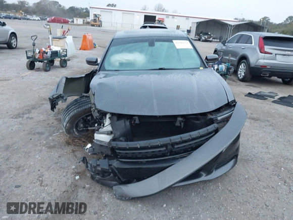 2019 Dodge Charger SXT with VIN 2C3CDXJG1KH730489, listed as a IAAI auction lot 41189171 with 39,514 mi miles and . Bid and sale history available at DreamBid. Image 12.