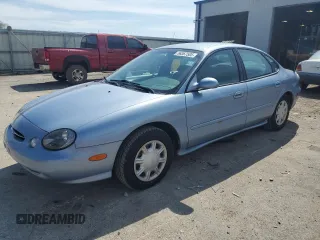 1998 Ford Taurus LX z VIN 1FAFP52U2WG169669, wystawiony jako Copart lot #56367585 z przebiegiem 76 618 mil mil oraz Czysty tytuł • Clean title. Historia ofert i sprzedaży dostępna na DreamBid. Obrazek 1.