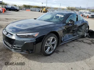 2023 Audi e-tron GT Premium Plus z VIN WAUFJBFWXP7003131, wystawiony jako Copart lot #38763864 z przebiegiem 16 636 mil mil oraz . Historia ofert i sprzedaży dostępna na DreamBid. Obrazek 1.