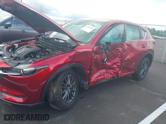 2019 Mazda CX-5 Sport with VIN JM3KFABM5K0627087, listed as a IAAI auction lot 42163866 with 38,050 mi miles and . Bid and sale history available at DreamBid. Image 6.