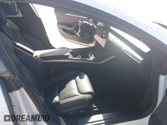 2022 Tesla Model S Plaid with VIN 5YJSA1E69NF486471, listed as a IAAI auction lot 41228818 with 49,207 mi miles and . Bid and sale history available at carsss.com. Image 5.