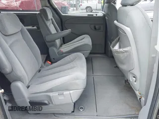 2005 Dodge Caravan SXT with VIN 2D4GP44L95R246244, listed as a IAAI auction lot 41855026 with 134,582 mi miles and . Bid and sale history available at DreamBid. Image 8.