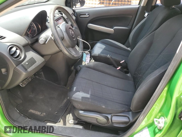 2012 Mazda 2 Sport with VIN JM1DE1KZ5C0141784, listed as a Copart auction lot 56498295 with 132,602 mi miles and Salvage Title. Bid and sale history available at DreamBid. Image 7.