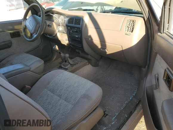 1999 Toyota Tacoma with VIN 4TAPM62N0XZ546880, listed as a Copart auction lot 88327105 with 234,164 mi miles and Salvage Title. Bid and sale history available at DreamBid. Image 8.