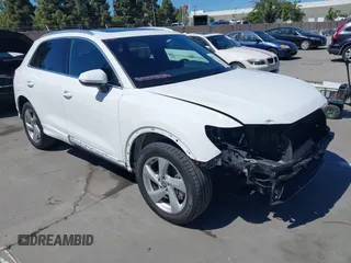 2020 Audi Q3 Premium with VIN WA1AECF36L1045753, listed as a IAAI auction lot 42300686 with 46,075 mi miles and . Bid and sale history available at DreamBid. Image 1.