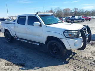 2011 Toyota Tacoma PreRunner z VIN 3TMKU4HN4BM029599, wystawiony jako IAAI lot #41732650 z przebiegiem 193 346 mil mil oraz . Historia ofert i sprzedaży dostępna na DreamBid. Obrazek 1.