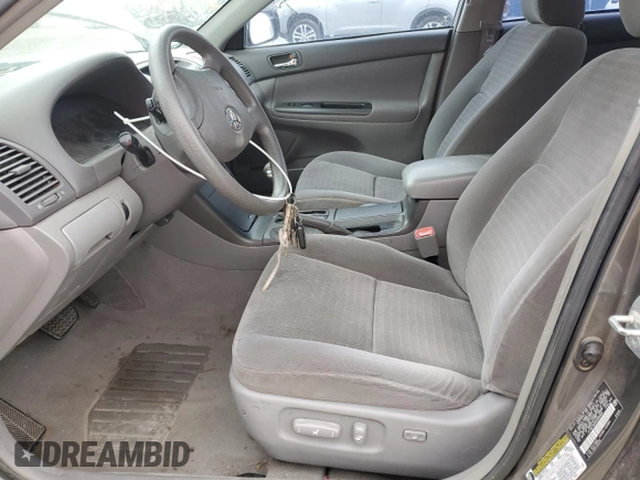 2005 Toyota Camry LE with VIN 4T1BE30K95U966890, listed as a Copart auction lot 56708695 with Not provided miles and Salvage title. Bid and sale history available at DreamBid. Image 7.