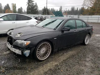 2007 BMW 7 Series 750i with VIN WBAHL83587DT89566, listed as a Copart auction lot 77712524 with 114,184 mi miles and Salvage title. Bid and sale history available at DreamBid. Image 1.