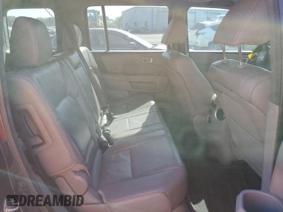 2013 Honda Pilot EX-L z VIN 5FNYF3H50DB004527, wystawiony jako Copart lot #53095845 z przebiegiem 161 100 mil mil oraz Czysty tytuł • Clean title. Historia ofert i sprzedaży dostępna na DreamBid. Obrazek 11.