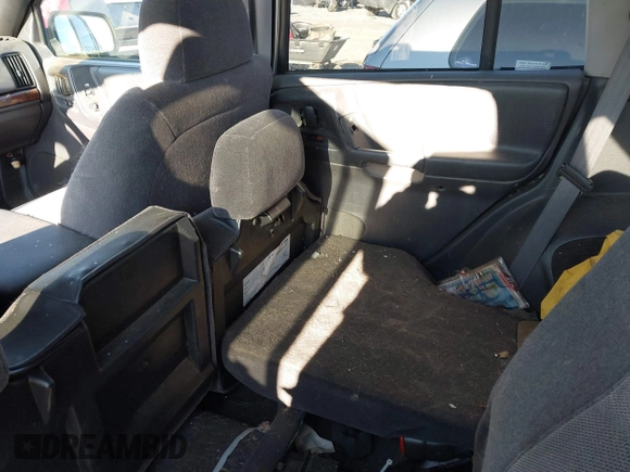 1997 Jeep Grand Cherokee Laredo with VIN 1J4GZ58SXVC687950, listed as a IAAI auction lot 40978411 with 176,514 mi miles. Bid and sale history available at carsss.com. Image 8.