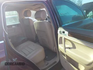 2008 Volkswagen Touareg V6 z VIN WVGBE77L38D044092, wystawiony jako IAAI lot #41766743 z przebiegiem Nie podano mil oraz . Historia ofert i sprzedaży dostępna na DreamBid. Obrazek 8.