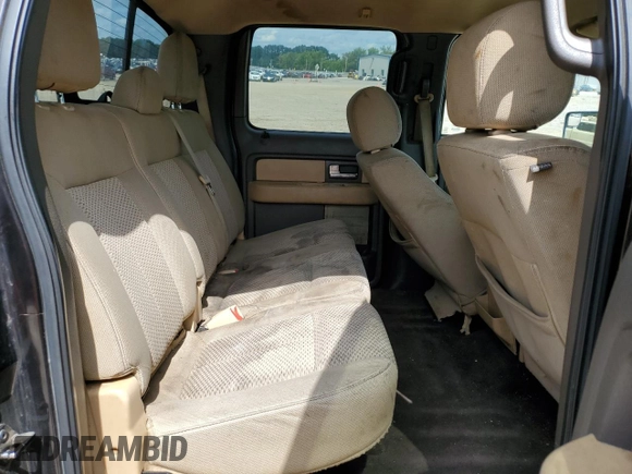 2014 Ford F-150 XL with VIN 1FTFW1EF4EKD49721, listed as a Copart auction lot 61695615 with 217,493 mi miles and Salvage title. Bid and sale history available at DreamBid. Image 10.