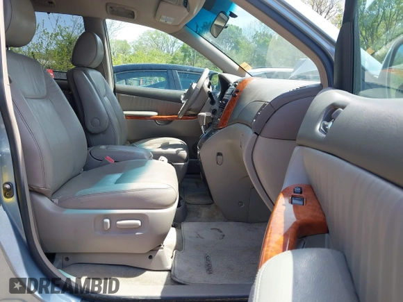 2009 Toyota Sienna XLE with VIN 5TDZK22C99S239755, listed as a IAAI auction lot 42096411 with 214,983 mi miles. Bid and sale history available at carsss.com. Image 5.