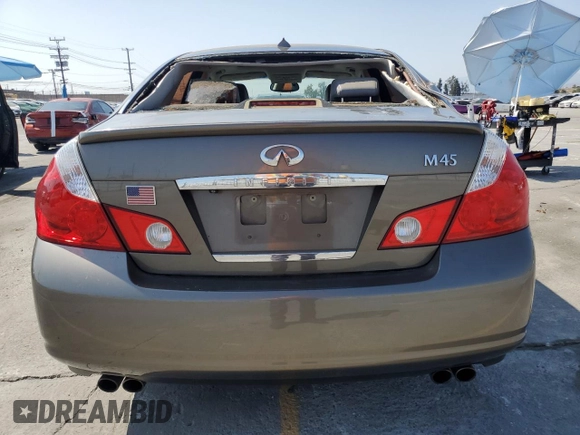 2006 Infiniti M Sport z VIN JNKBY01E26M207095, wystawiony jako Copart lot #58863805 z przebiegiem 97 945 mil mil oraz Szkoda całkowita • Salvage title. Historia ofert i sprzedaży dostępna na DreamBid. Obrazek 6.