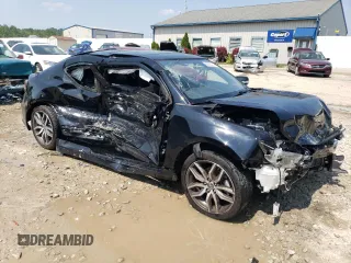 2016 Scion tC z VIN JTKJF5C7XGJ016874, wystawiony jako Copart lot #66390414 z przebiegiem 93 231 mil mil oraz Nie do naprawy. Historia ofert i sprzedaży dostępna na DreamBid. Obrazek 4.