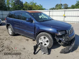 2017 Jeep Grand Cherokee Laredo with VIN 1C4RJEAG0HC804595, listed as a Copart auction lot 53173495 with 61,172 mi miles and Salvage title. Bid and sale history available at DreamBid. Image 4.