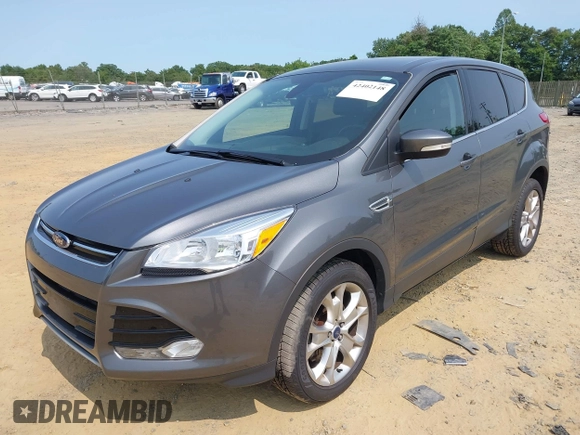 2013 Ford Escape SEL with VIN 1FMCU9H99DUC25469, listed as a IAAI auction lot 42402148 with 99,830 mi miles and . Bid and sale history available at DreamBid. Image 2.