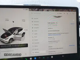 2023 Tesla Model Y Long Range z VIN 7SAYGDEE9PF623285, wystawiony jako IAAI lot #41383184 z przebiegiem 34 092 mil mil oraz . Historia ofert i sprzedaży dostępna na DreamBid. Obrazek 7.