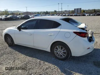 2015 Mazda 3 i Touring with VIN JM1BM1V70F1265495, listed as a Copart auction lot 52867345 with 154,496 mi miles and Salvage Title. Bid and sale history available at DreamBid. Image 2.