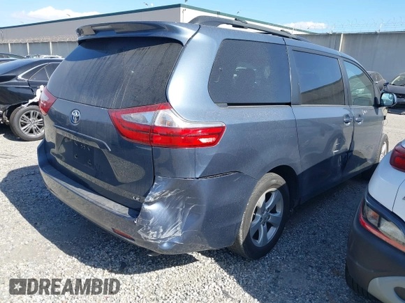 2015 Toyota Sienna LE AAS with VIN 5TDKK3DC7FS649602, listed as a IAAI auction lot 42152836 with 70,892 mi miles and . Bid and sale history available at DreamBid. Image 4.