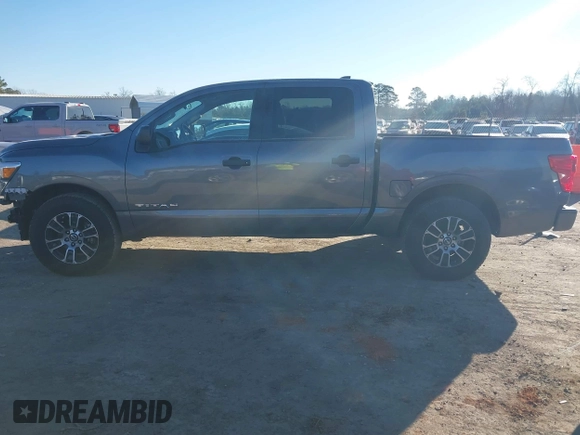 2022 Nissan Titan SV with VIN 1N6AA1EE3NN104176, listed as a IAAI auction lot 41159789 with 53,991 mi miles and . Bid and sale history available at DreamBid. Image 14.