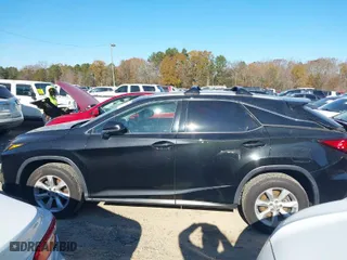 2017 Lexus RX with VIN 2T2BZMCA9HC096685, listed as a IAAI auction lot 40951685 with 128,112 mi miles. Bid and sale history available at carsss.com. Image 14.