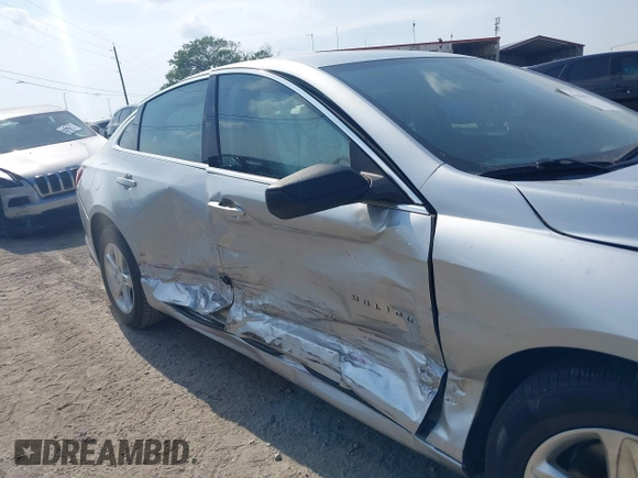 2019 Chevrolet Malibu LS with VIN 1G1ZB5ST5KF222757, listed as a IAAI auction lot 41846637 with 82,296 mi miles and . Bid and sale history available at DreamBid. Image 6.