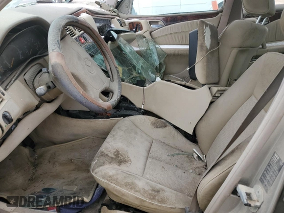 1998 Mercedes-Benz E-Class with VIN WDBJF65F4WA619026, listed as a Copart auction lot 42602915 with 202,430 mi miles and Salvage Title. Bid and sale history available at carsss.com. Image 7.
