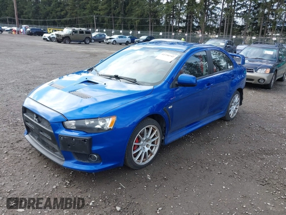 2015 Mitsubishi Lancer Evolution GSR with VIN JA32W8FV4FU012578, listed as a IAAI auction lot 41730742 with 64,762 mi miles. Bid and sale history available at carsss.com. Image 18.