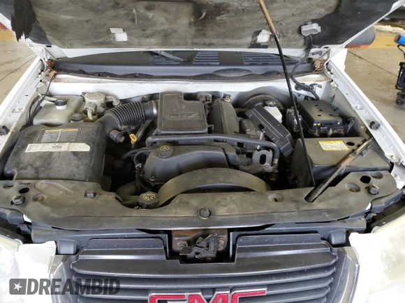 2002 GMC Envoy SLT with VIN 1GKDT13S622231265, listed as a Copart auction lot 45037215 with 213,069 mi miles and Salvage Title. Bid and sale history available at carsss.com. Image 12.