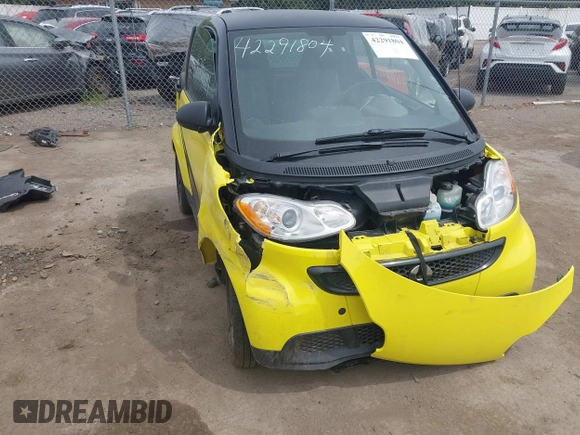 2013 Smart fortwo Pure with VIN WMEEJ3BA5DK663165, listed as a IAAI auction lot 42291804 with 105,074 mi miles and . Bid and sale history available at DreamBid. Image 6.