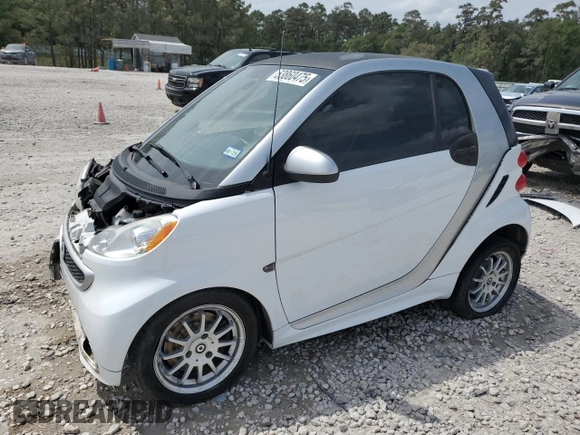 2015 Smart fortwo Passion с VIN WMEEJ3BA6FK807938, выставлен на аукционе Copart как лот 53860475 с пробегом 77 748 миль миль и Списание • Salvage title. История ставок и продаж доступна на DreamBid. Изображение 1.