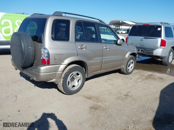 2005 Suzuki Grand Vitara LX with VIN JS3TD62V454200331, listed as a IAAI auction lot 41896812 with 122,974 mi miles. Bid and sale history available at carsss.com. Image 4.