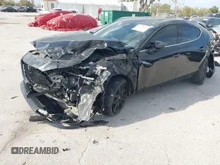 2023 Mazda 3 Premium Plus z VIN JM1BPBNY0P1615814, wystawiony jako IAAI lot #41718577 z przebiegiem Nie podano mil oraz . Historia ofert i sprzedaży dostępna na DreamBid. Obrazek 17.