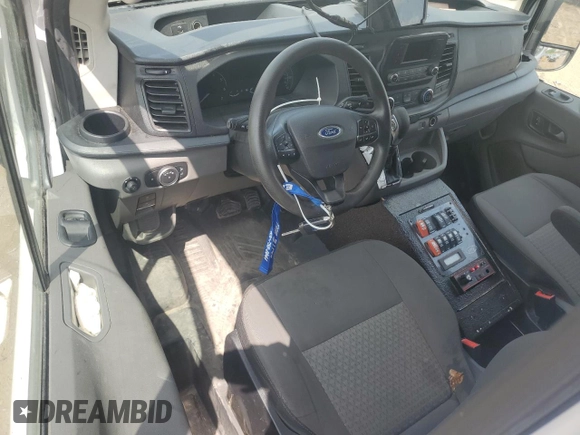 2021 Ford Transit z VIN 1FDBR1CG2MKA65340, wystawiony jako Copart lot #56920445 z przebiegiem Nie podano mil oraz Szkoda całkowita • Salvage title. Historia ofert i sprzedaży dostępna na DreamBid. Obrazek 8.