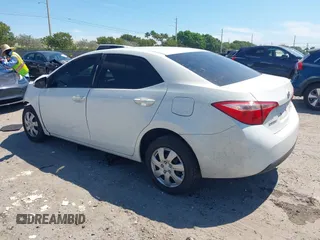 2019 Toyota Corolla L with VIN 5YFBURHE0KP882524, listed as a IAAI auction lot 41862382 with 84,981 mi miles. Bid and sale history available at carsss.com. Image 3.