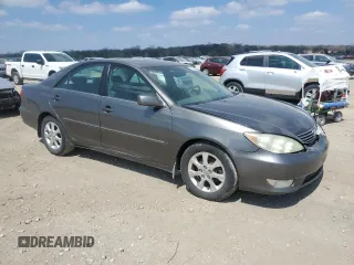 2005 Toyota Camry LE with VIN 4T1BF32K85U614653, listed as a Copart auction lot 52860195 with 156,675 mi miles and Salvage Title. Bid and sale history available at DreamBid. Image 4.