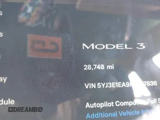 2022 Tesla Model 3 with VIN 5YJ3E1EA9NF147836, listed as a IAAI auction lot 41363603 with 28,748 mi miles. Bid and sale history available at carsss.com. Image 15.