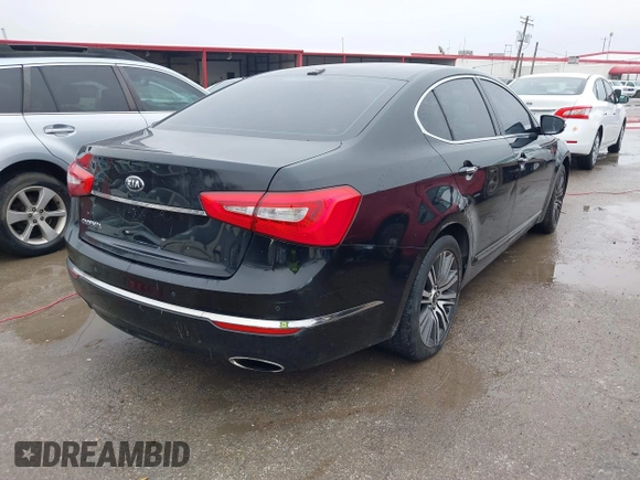 2015 Kia Cadenza Premium with VIN KNALN4D78F5169611, listed as a IAAI auction lot 41457679 with 102,166 mi miles. Bid and sale history available at carsss.com. Image 4.