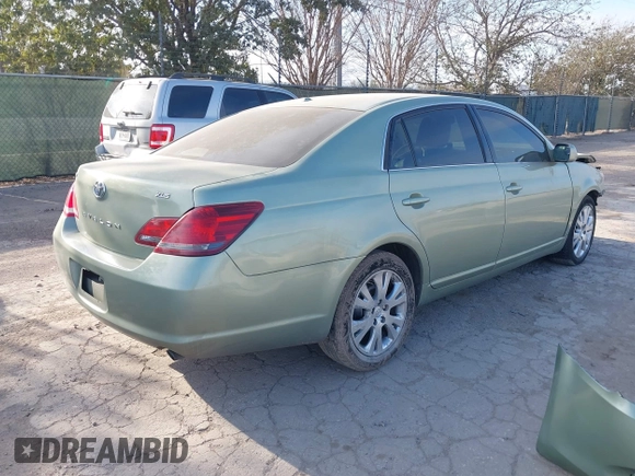 2010 Toyota Avalon XL with VIN 4T1BK3DB9AU354427, listed as a IAAI auction lot 41614018 with Not Provided miles and . Bid and sale history available at carsss.com. Image 4.