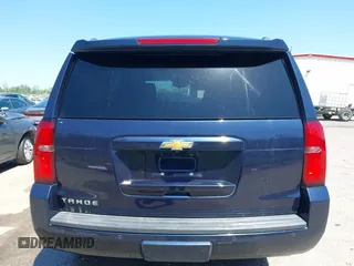 2018 Chevrolet Tahoe LT with VIN 1GNSCBKC0JR138385, listed as a IAAI auction lot 41977300 with 104,987 mi miles and . Bid and sale history available at DreamBid. Image 16.